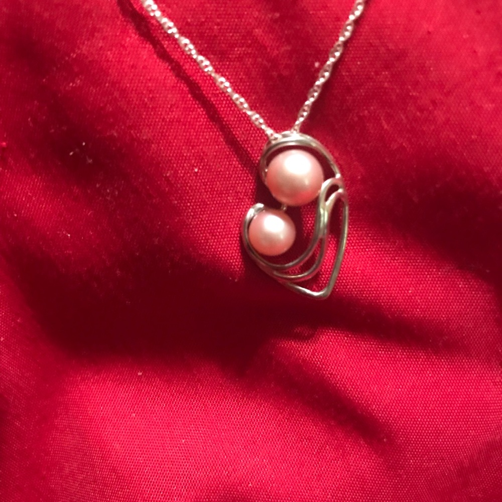 Silver- Pearl mother/child necklace. Never worn.